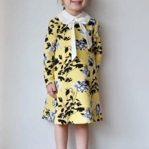 Rochita pentru fetite Dy Fashion galbena cu imprimeu si funda la guler